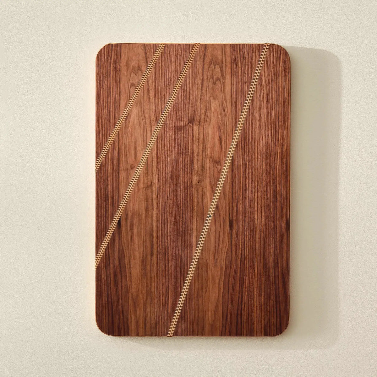 Sunbeam walnut wall art panel with three diagonal Baltic birch stripe inlays