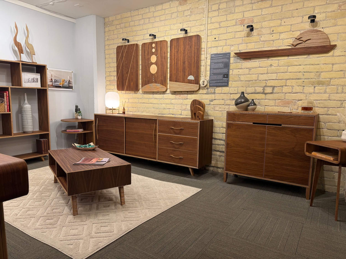 Room with brick walls with wooden furniture and decorative items