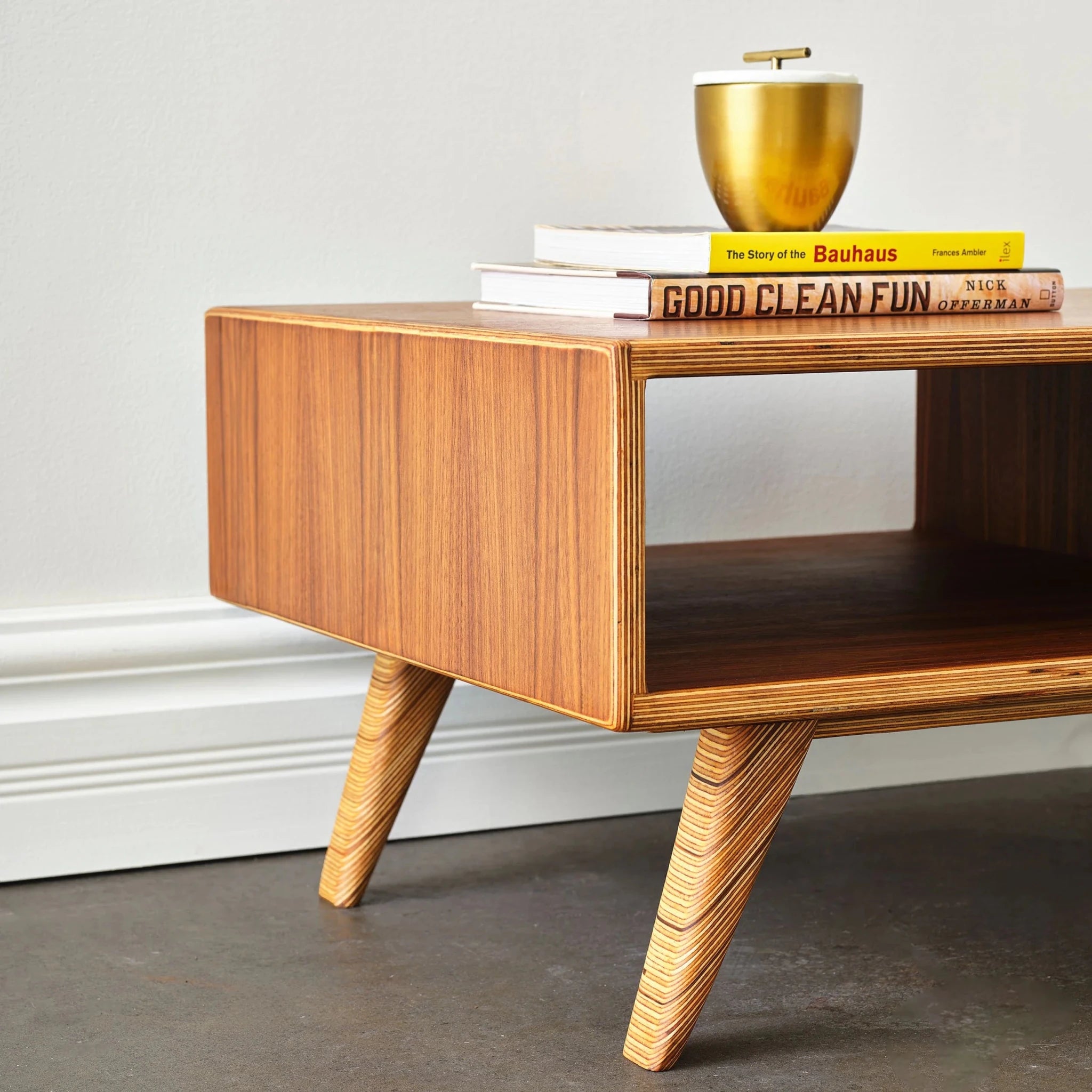 Close-up of coffee table legs showing Baltic birch plywood edge grain
