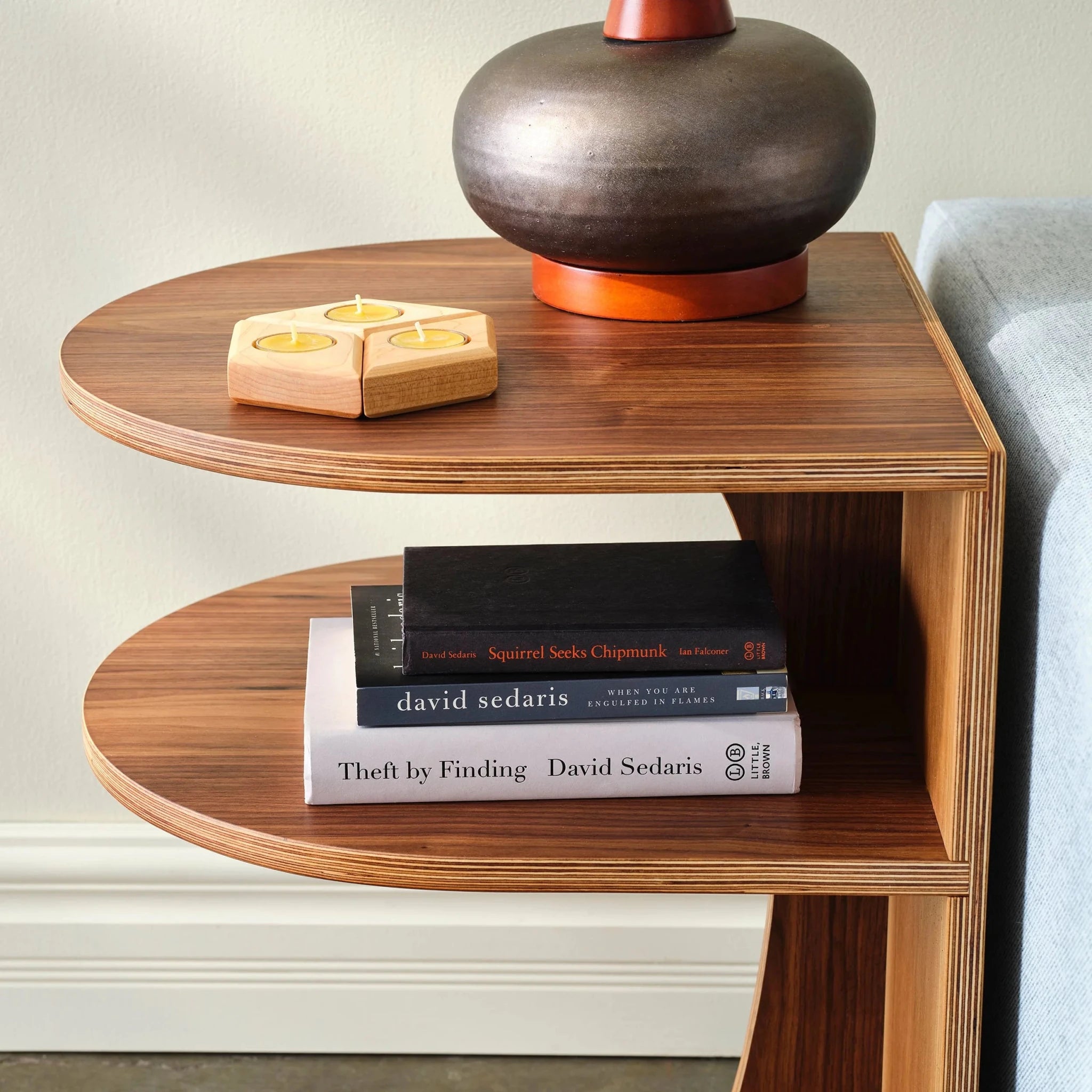 Walnut End Table No. 2 detail, ceramic lamp, maple tealight holder, stacked Sedaris books