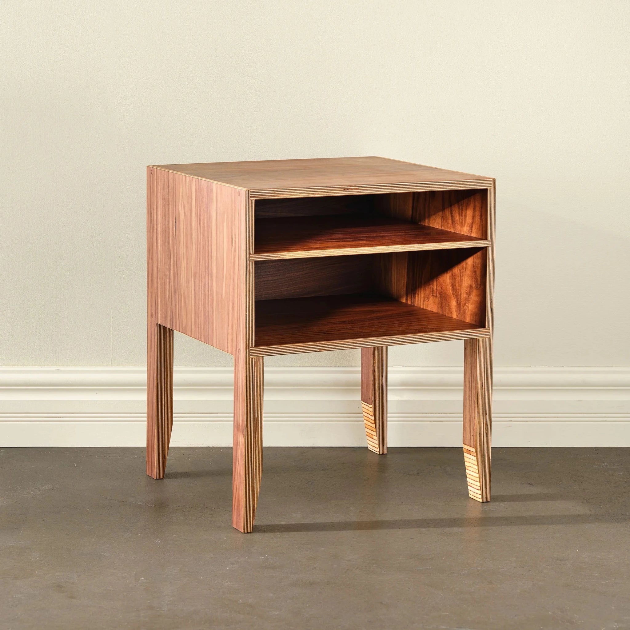 Open-shelf nightstand in walnut and birch, empty, angled view