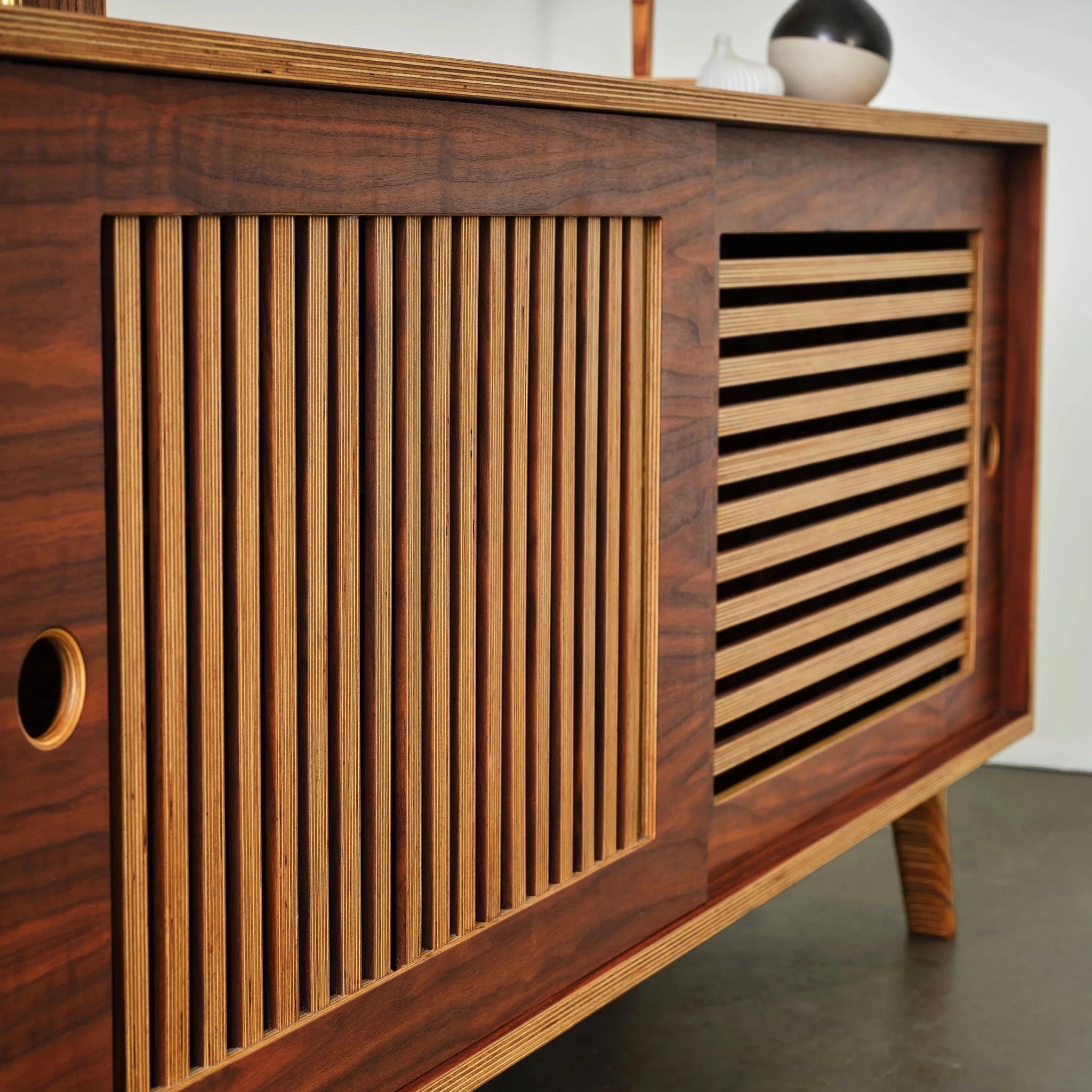 Walnut Media Console No. 1 angled close-up of vertical and horizontal slatted sliding doors